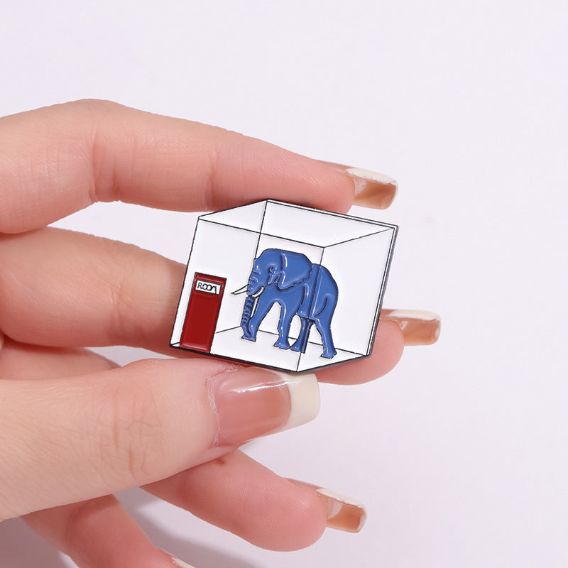 Broche de elefante atrapado creativo geométrico con forma de cubo de agua con insignia dorada M