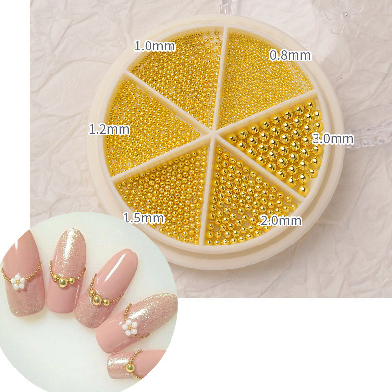 Joyas para uñas que combinan diamantes de imitación y perlas