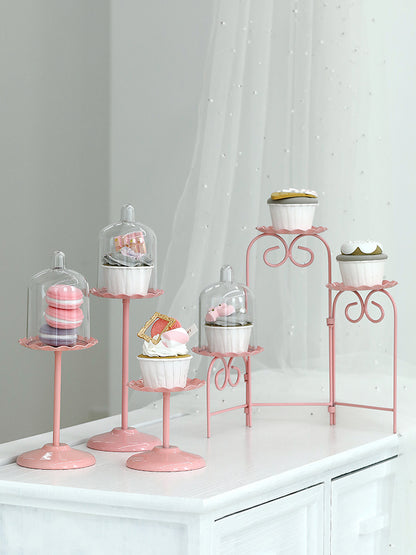 Mesa de postres para bodas con soporte para tartas de color rosa