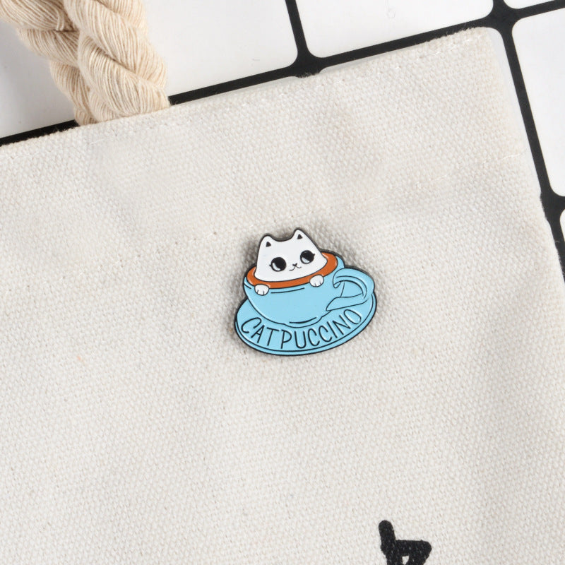 Broche con forma de taza de té azul con forma de gato blanco y bonito recuerdo de cafetería con temática de mascotas