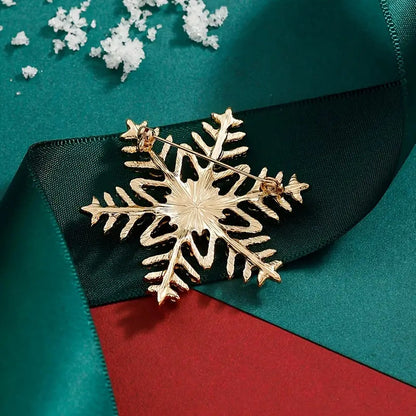 Broche de copo de nieve navideño con incrustaciones de diamantes de imitación de colores y aleación creativa