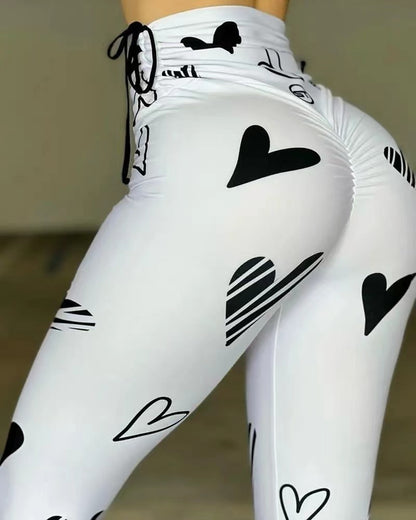 Leggings deportivos de yoga, hip-hop y fitness con estampado de corazones y cordón ajustable