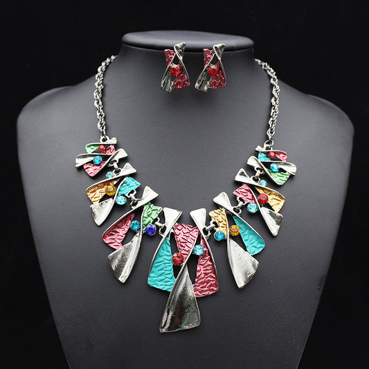 Conjunto de collar y pendientes de diamantes de aleación de colores de moda europea y americana, joyería de novia directa de fábrica