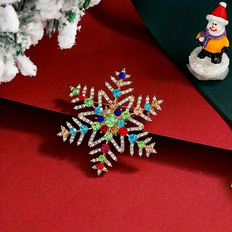 Broche de copo de nieve navideño con incrustaciones de diamantes de imitación de colores y aleación creativa