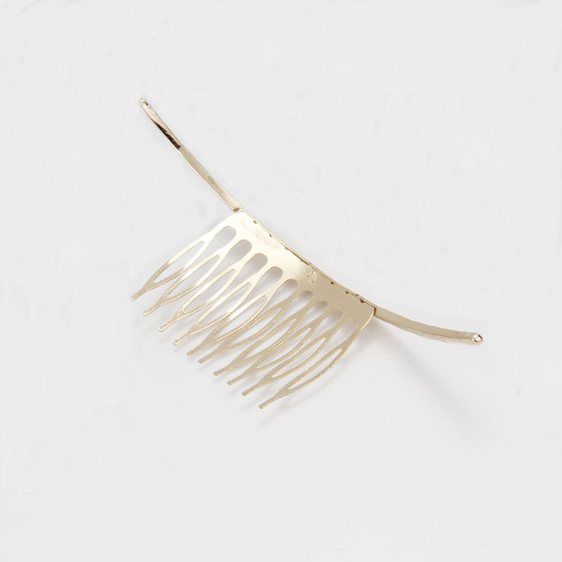 Curved hair comb