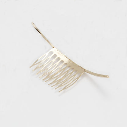 Curved hair comb