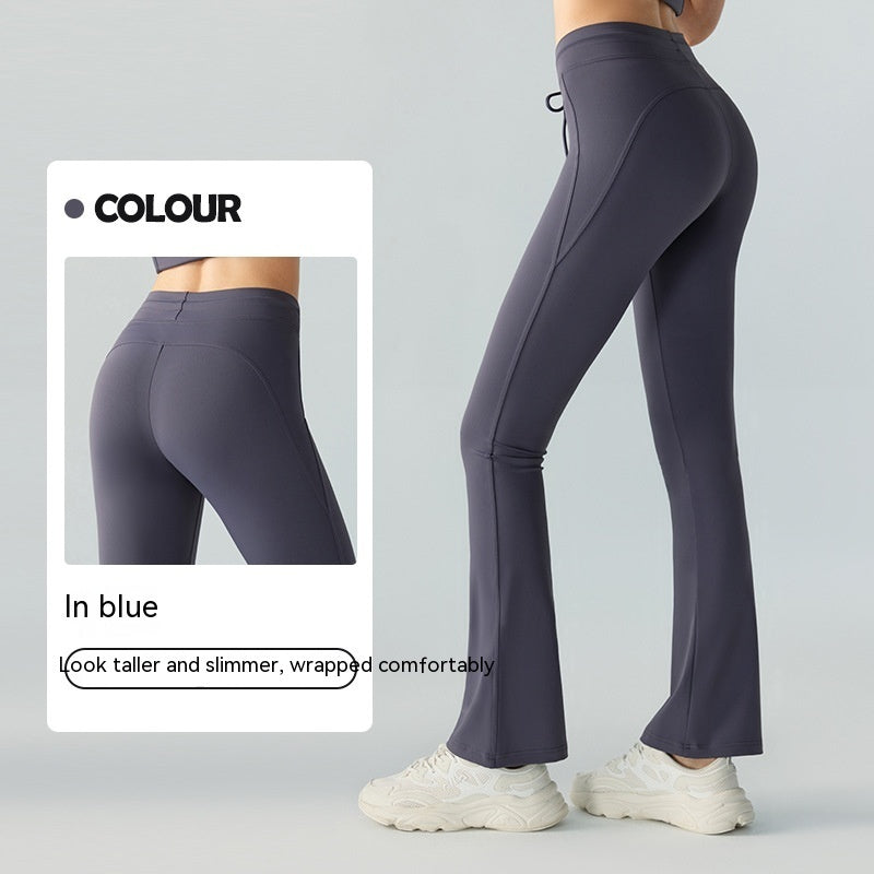 Pantalones de yoga casuales que adelgazan la cintura y levantan la cadera Pantalones de yoga con bolsillos bilaterales y cintura acampanada