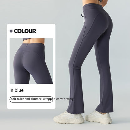 Pantalones de yoga casuales que adelgazan la cintura y levantan la cadera Pantalones de yoga con bolsillos bilaterales y cintura acampanada