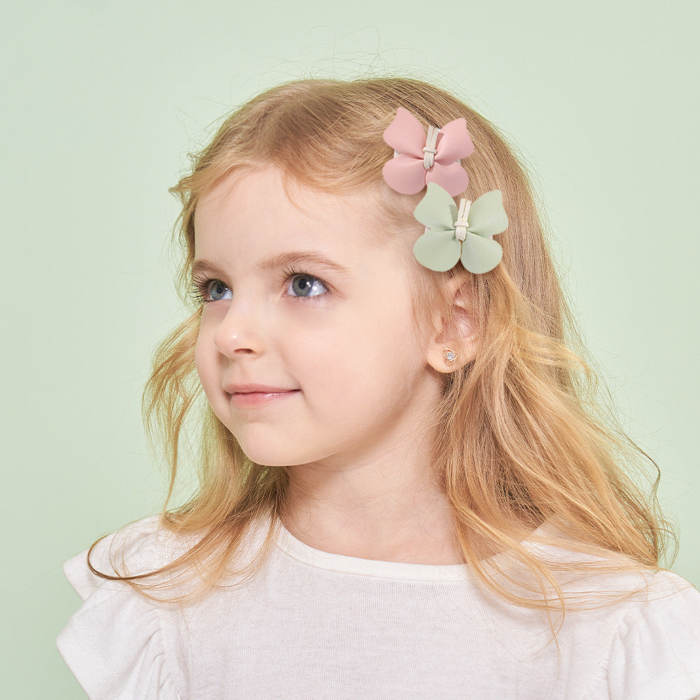 Nuevas pinzas para el pelo de piel sintética con forma de mariposa para niñas