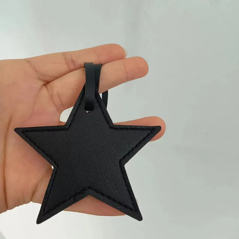 Llavero de cuero con forma de estrella de cinco puntas, colgante para bolso