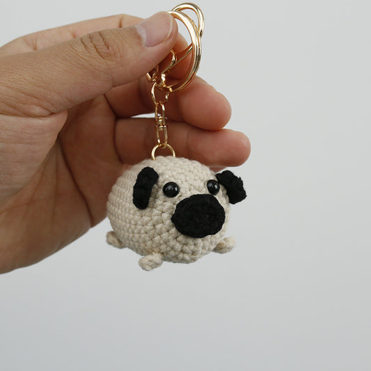 Colgante de muñeca tejida a mano con forma de perro Pug Llavero tejido a crochet de lana para mujer Producto terminado hecho a mano exquisito