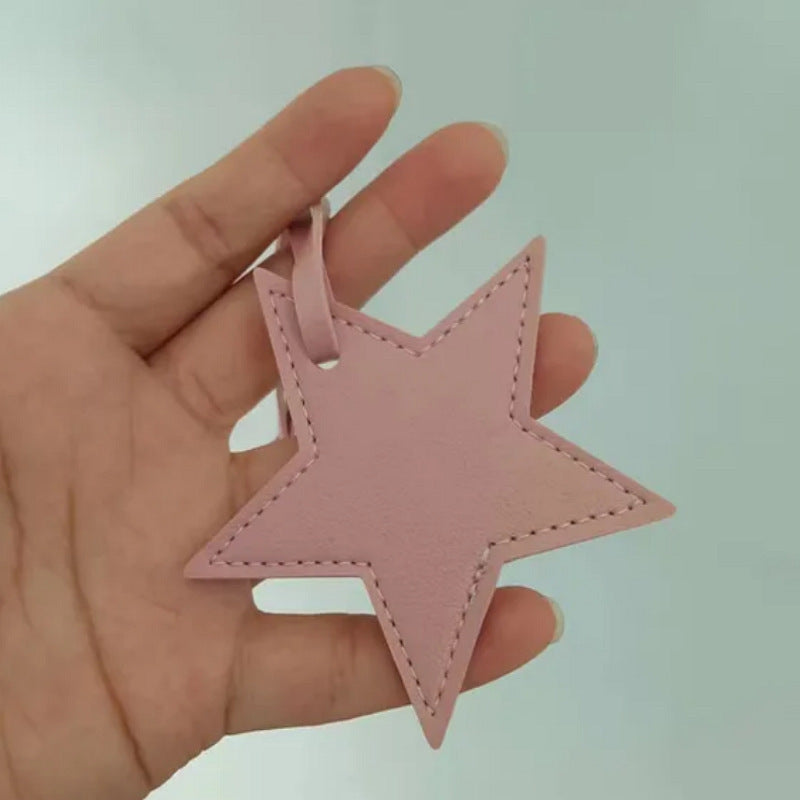 Llavero de cuero con forma de estrella de cinco puntas, colgante para bolso