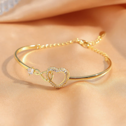 Pulsera con forma de corazón ahuecada y cadena, diseño elegante de alta calidad para mujer