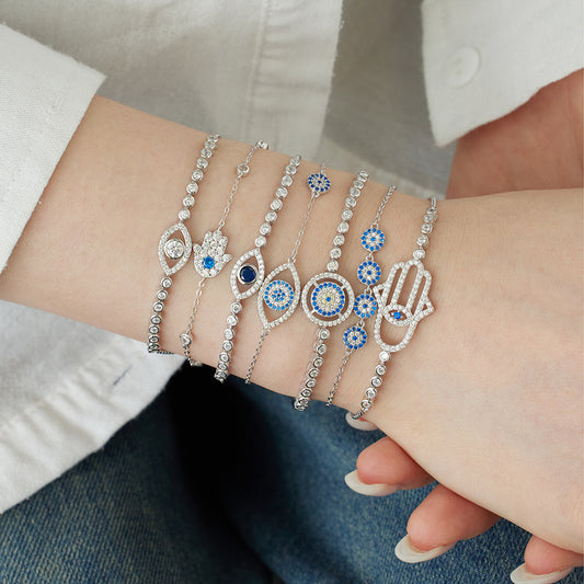 Pulsera elegante de lujo con luz de interés especial con diseño de modelado de ojos azules de alta calidad