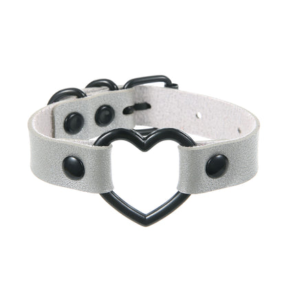 Pulsera de cuero hueca con forma de corazón de melocotón oscuro, estilo punk, moderna y elegante