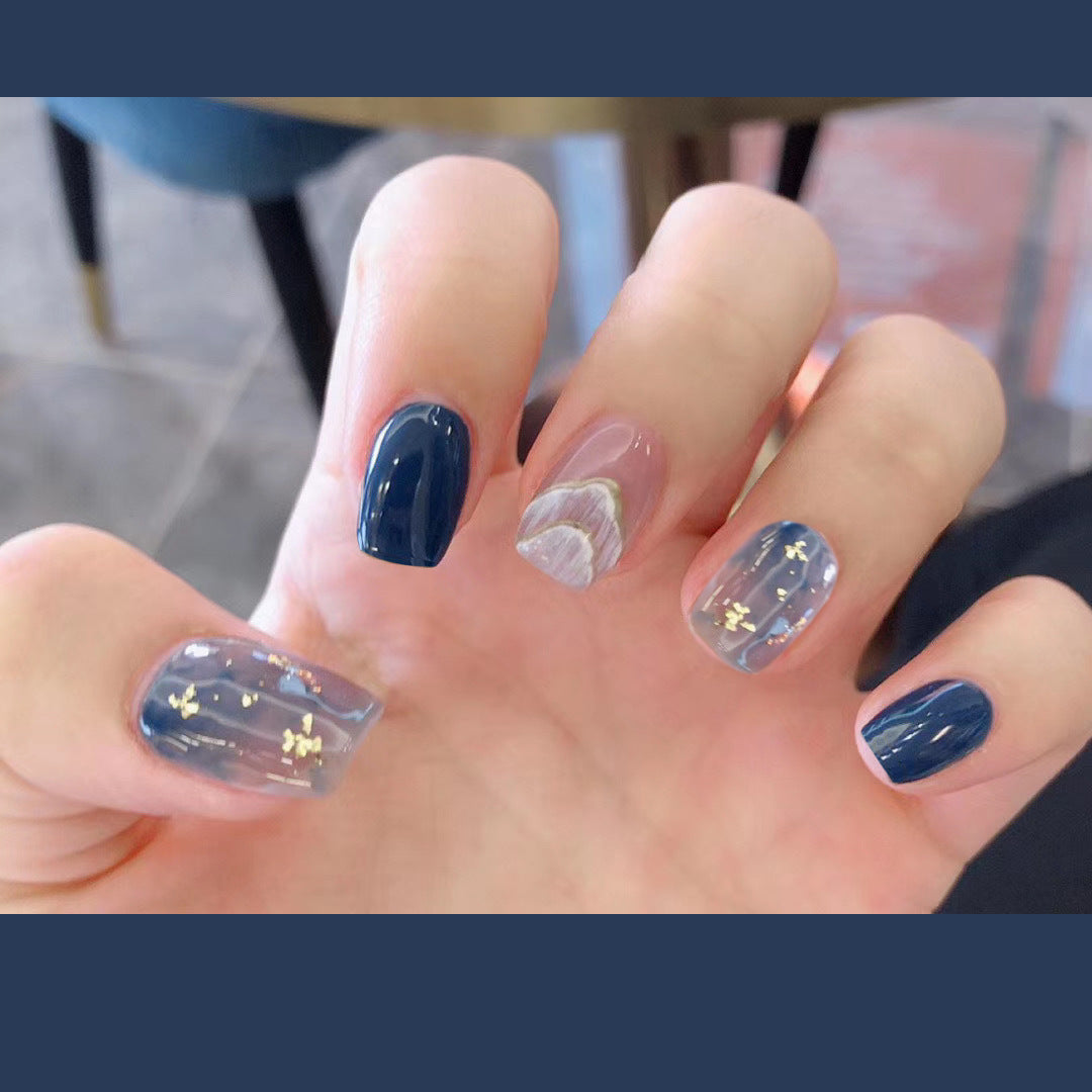 Pegatinas de uñas postizas con manchas de color azul marino para usar uñas