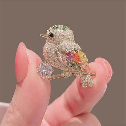 Broche de pájaro urraca con diamantes