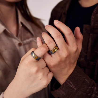 Pareja Un par de anillos de oro y plata